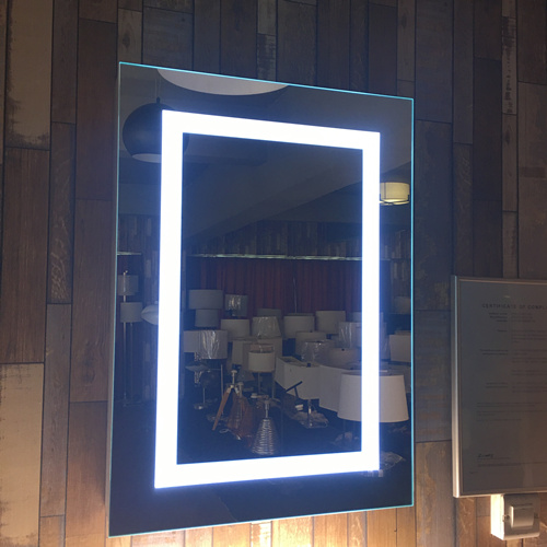 Backlit bathroom mirror cabinet