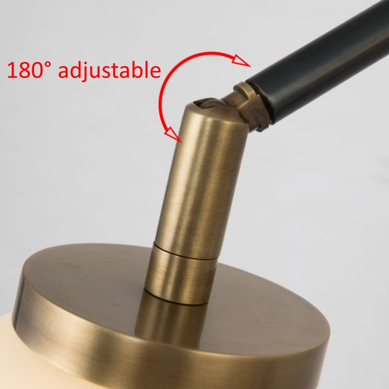 Adjustable wall lamp with swing arm