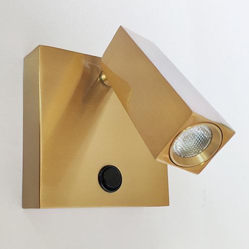 Adjustable wall mounted reading light